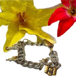 Never worn! Silver & gold-toned rodeo bracelet with the cutest charms!